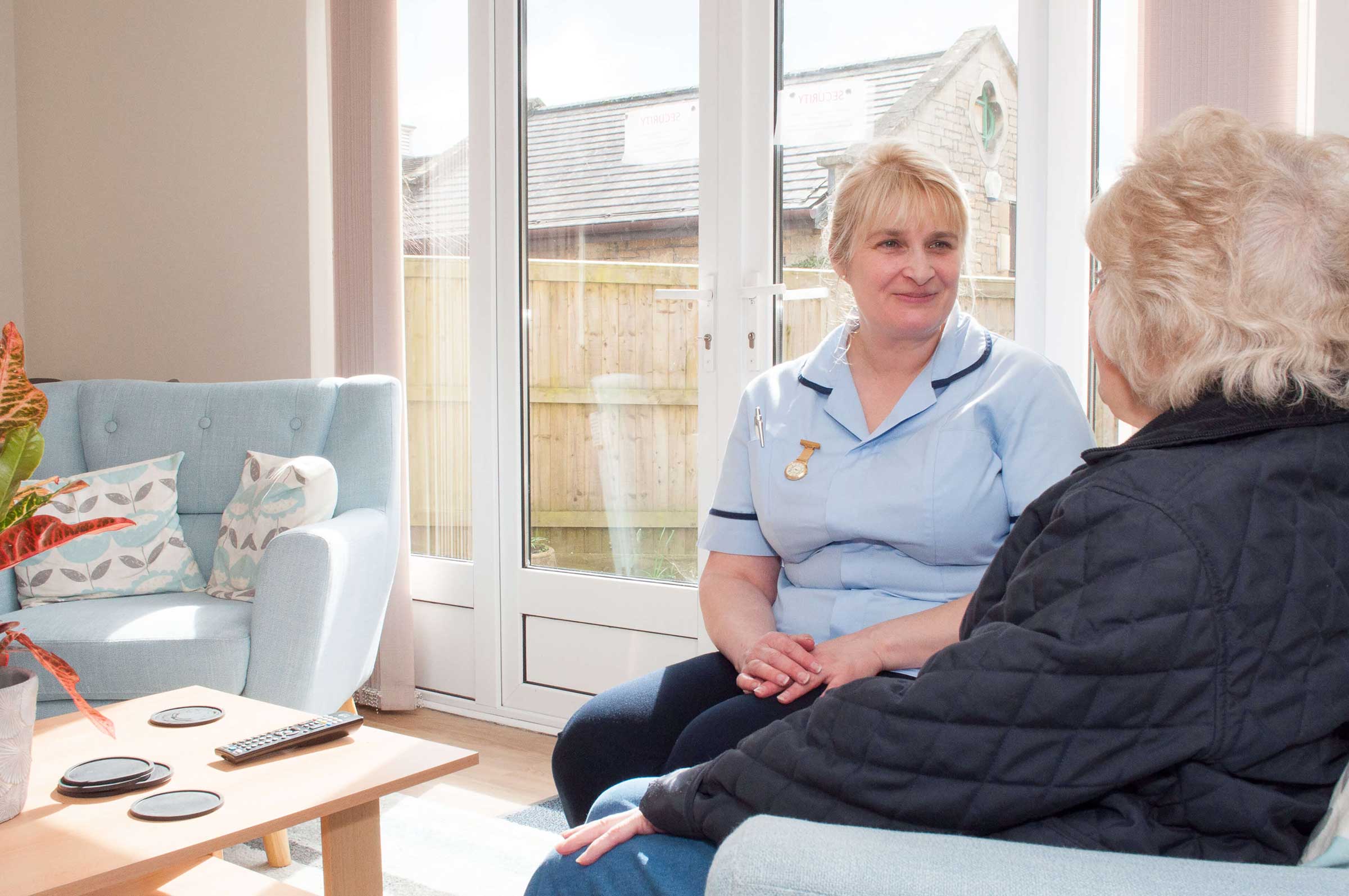 Elaine Kynaston - healthcare professional talking with patient